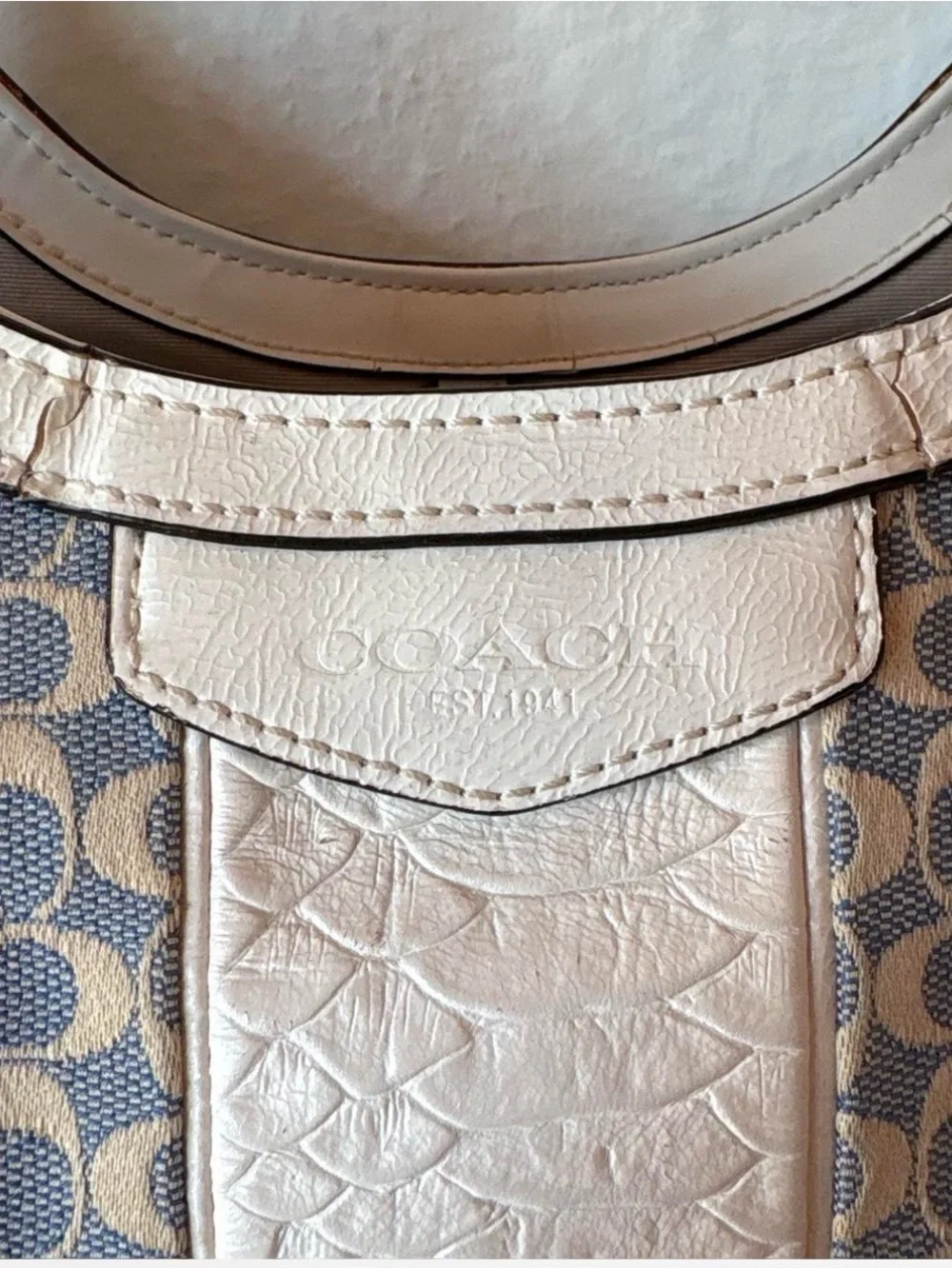 Sold Coach blue and cream